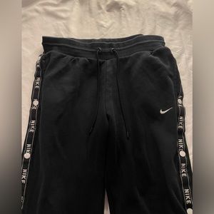 nike black side button sweatpants